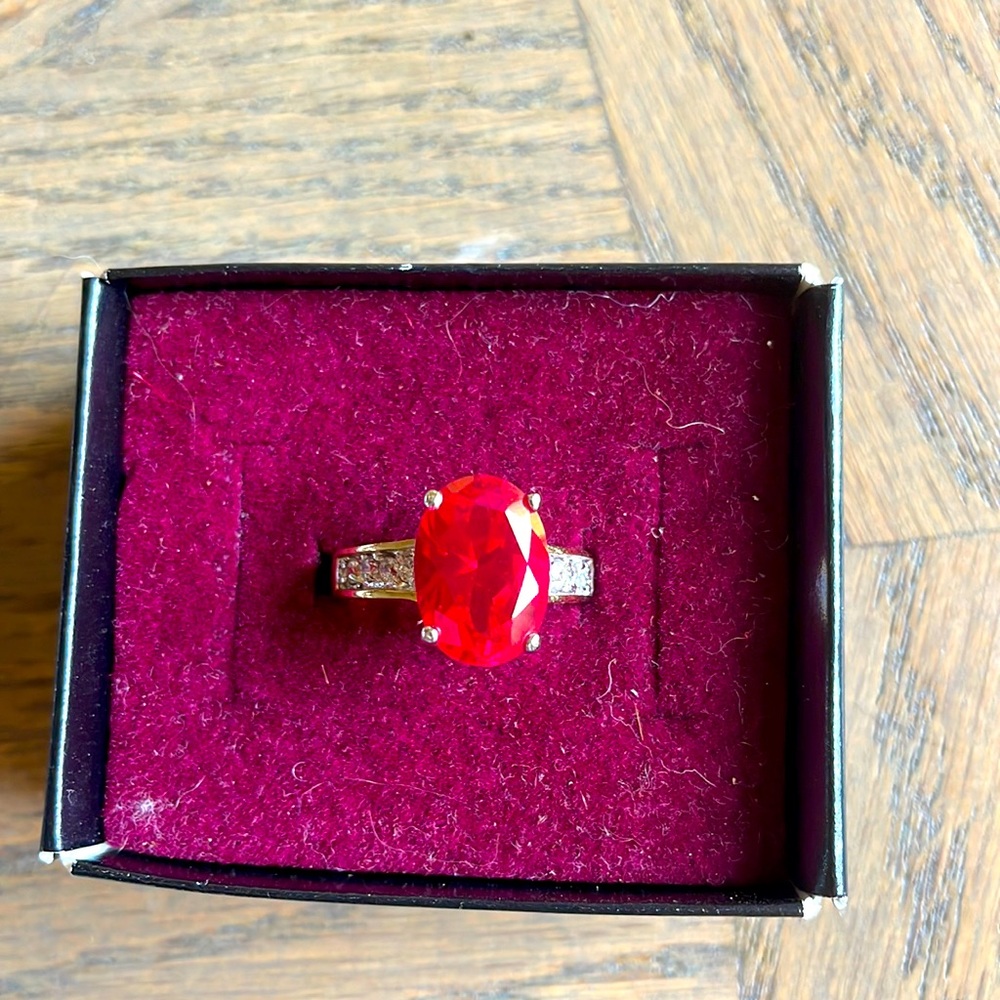 Ruby red cut stone ring gold tone